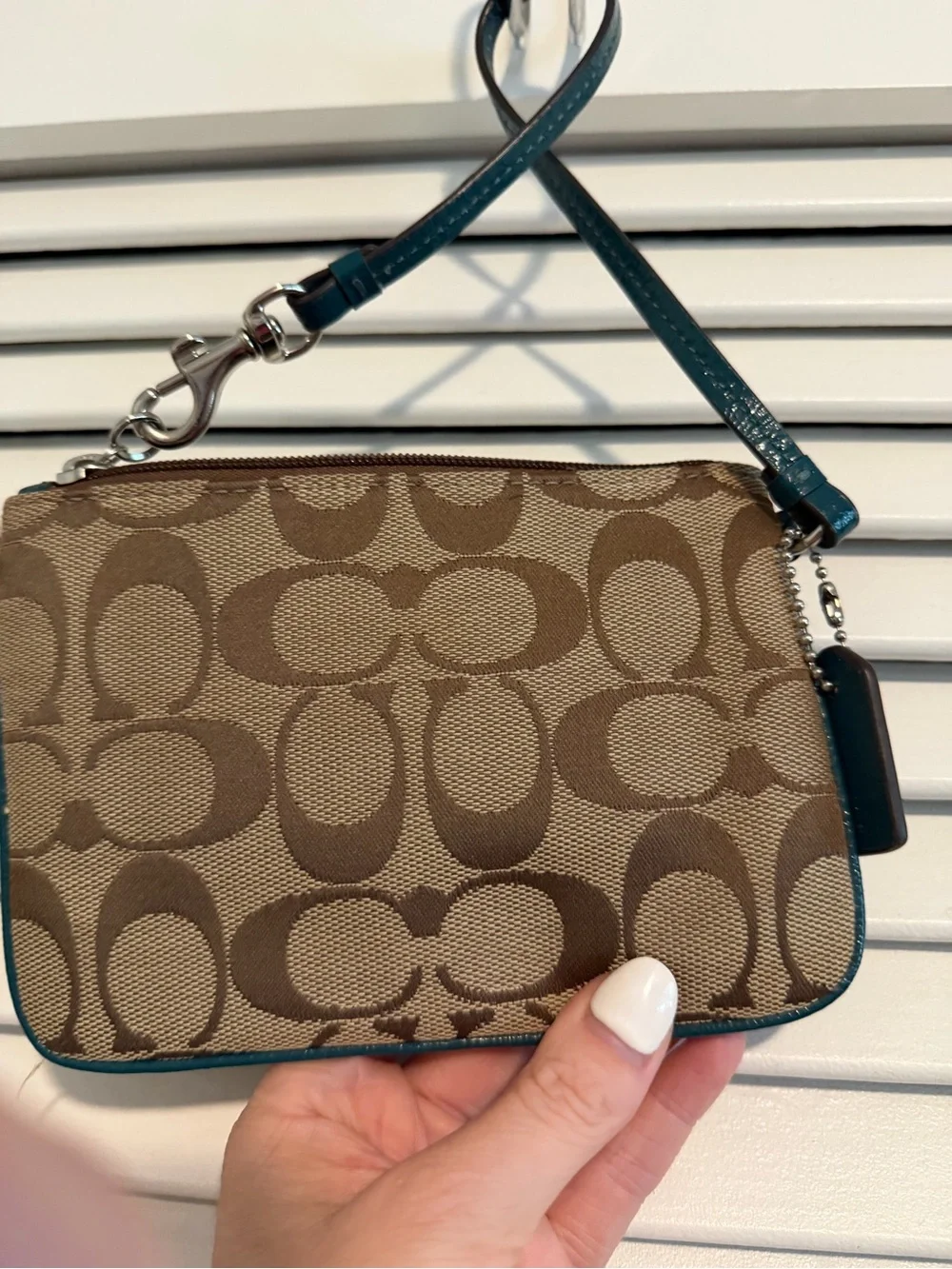 Coach two wristlets